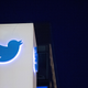 The Twitter logo is seen on a sign at the company’s headquarters in San Francisco, California.